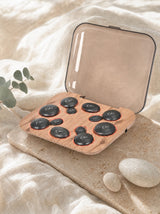 Kiki hot stone massage set on a calm spa surface