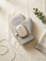 ThermoPress hand massager detail with USB-C charging